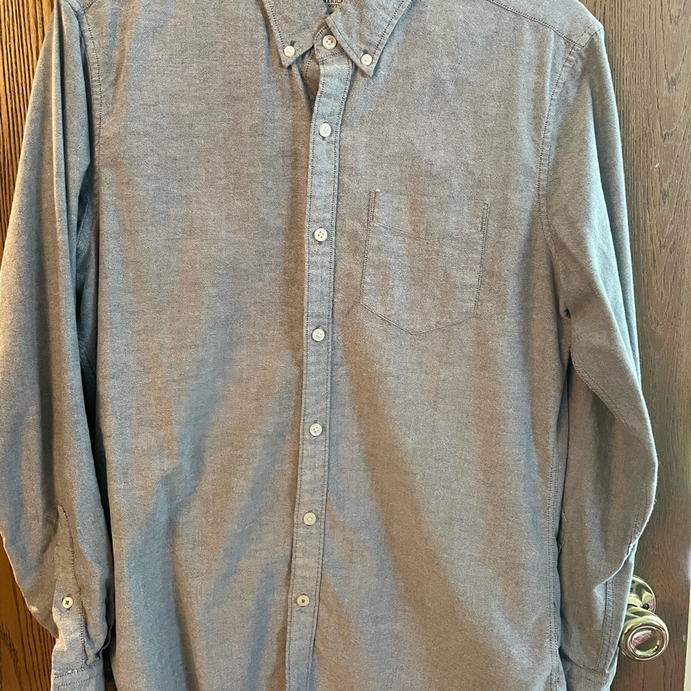 Long sleeved dark gray shirt